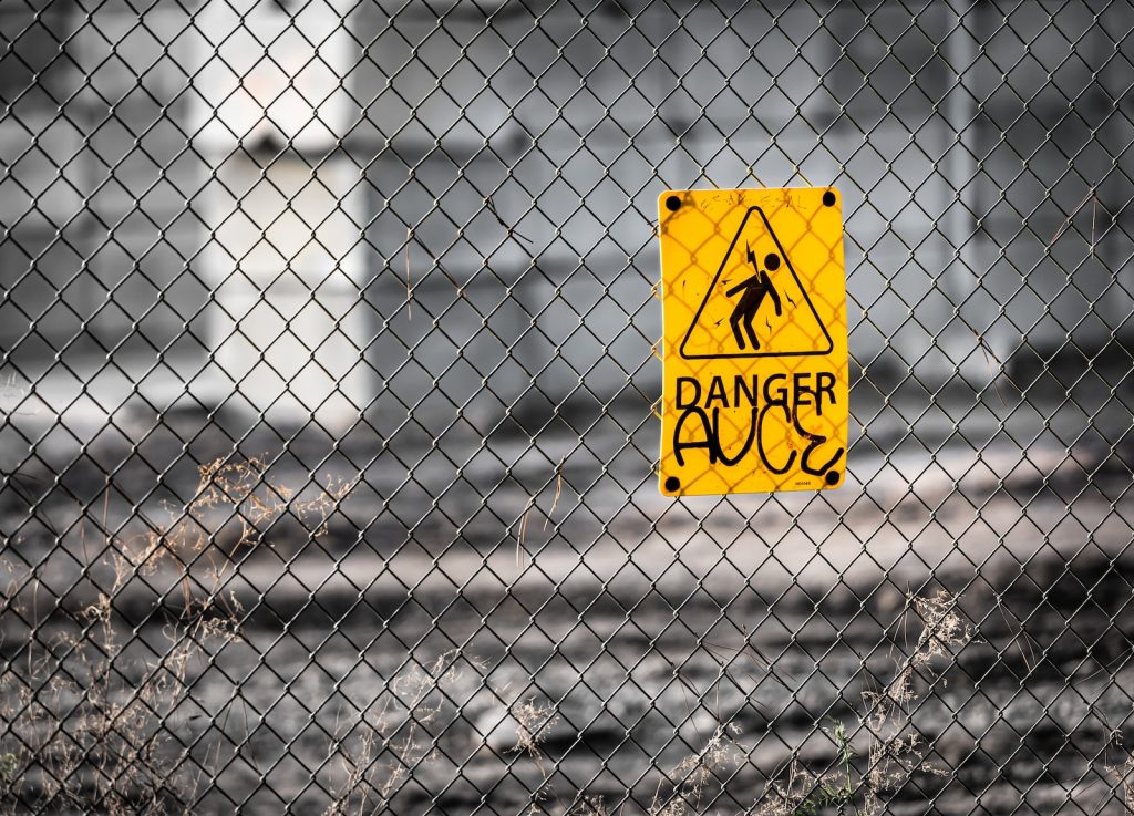 chain fence with danger signage